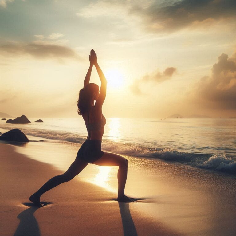 Individual performing Warrior II Pose on a serene beach at sunrise